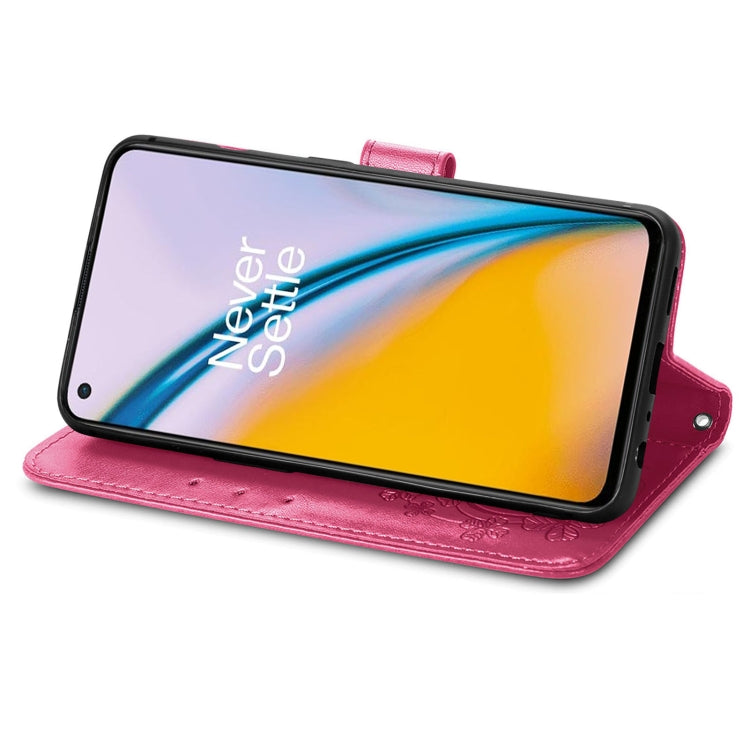 For OnePlus Nord 2 5G Four-leaf Clasp Embossed Buckle Mobile Phone Protection Leather Case with Lanyard & Card Slot & Wallet & Bracket Function