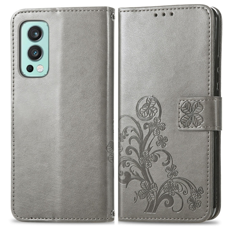 For OnePlus Nord 2 5G Four-leaf Clasp Embossed Buckle Mobile Phone Protection Leather Case with Lanyard & Card Slot & Wallet & Bracket Function