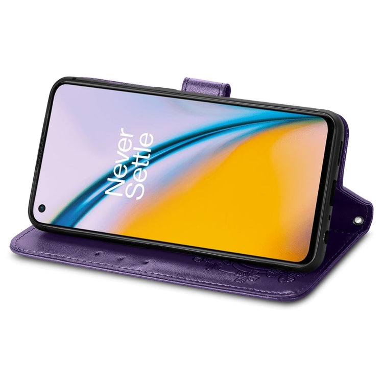 For OnePlus Nord 2 5G Four-leaf Clasp Embossed Buckle Mobile Phone Protection Leather Case with Lanyard & Card Slot & Wallet & Bracket Function