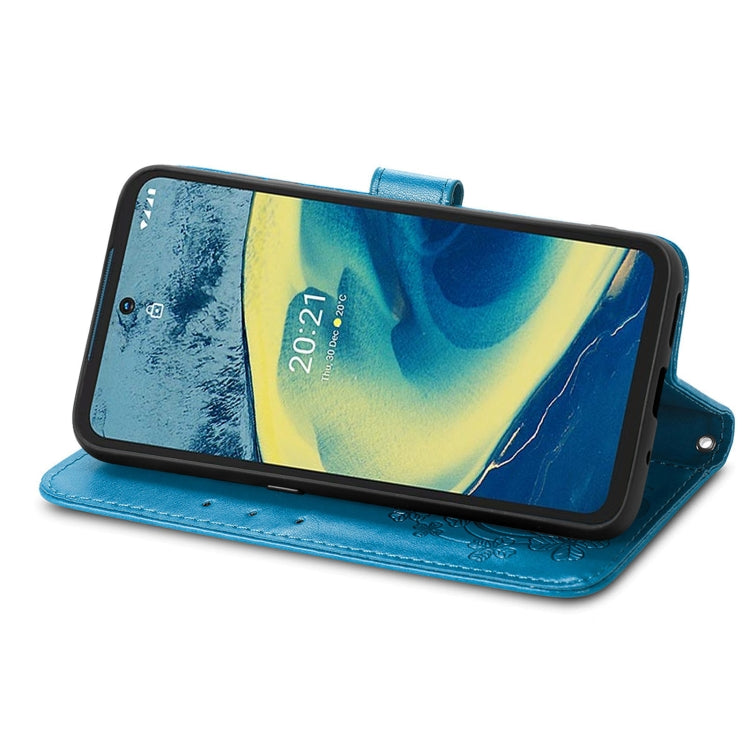 For Nokia  XR 20 Four-leaf Clasp Embossed Buckle Mobile Phone Protection Leather Case with Lanyard & Card Slot & Wallet & Bracket Function