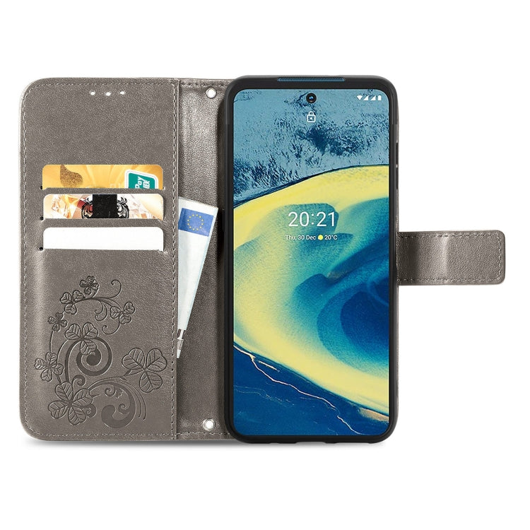 For Nokia  XR 20 Four-leaf Clasp Embossed Buckle Mobile Phone Protection Leather Case with Lanyard & Card Slot & Wallet & Bracket Function