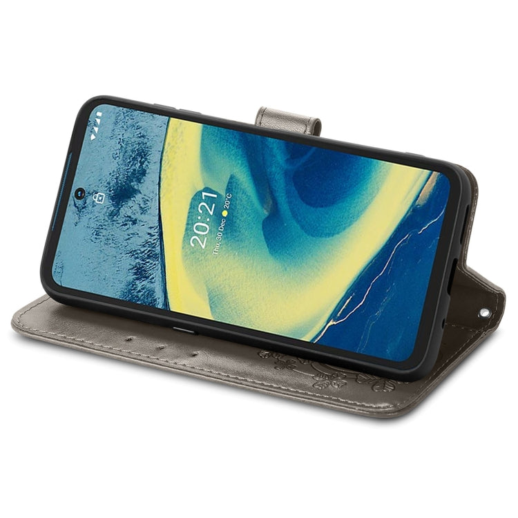 For Nokia  XR 20 Four-leaf Clasp Embossed Buckle Mobile Phone Protection Leather Case with Lanyard & Card Slot & Wallet & Bracket Function