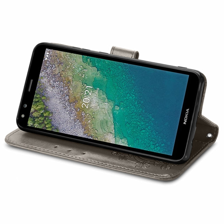 For Nokia C01 Plus Four-leaf Clasp Embossed Buckle Mobile Phone Protection Leather Case with Lanyard & Card Slot & Wallet & Bracket Function