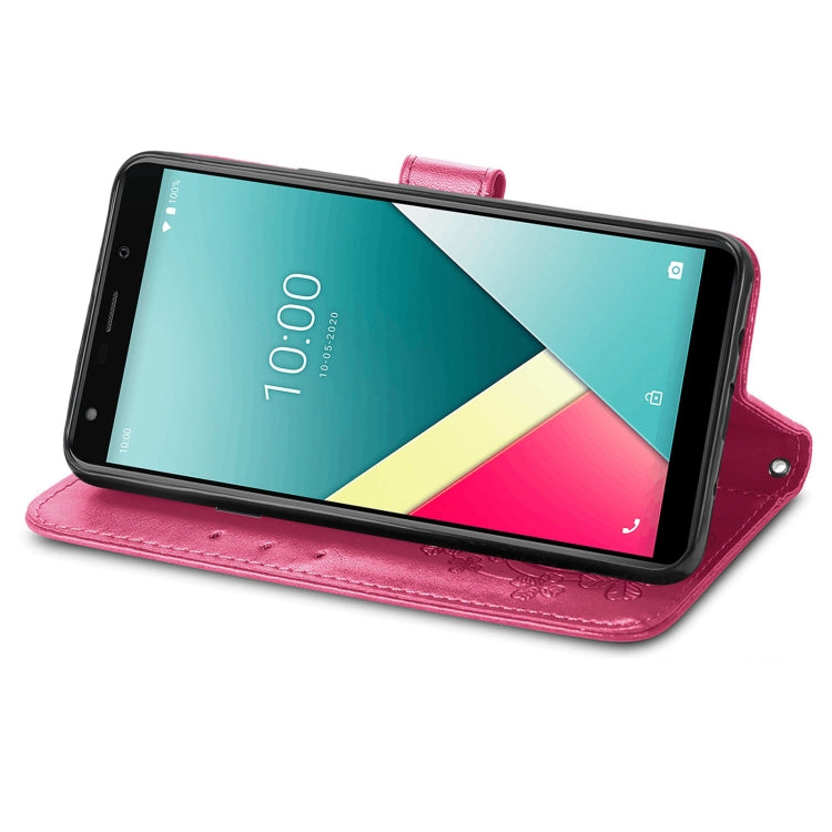 For Wiko Y61 Four-leaf Clasp Embossed Buckle Mobile Phone Protection Leather Case with Lanyard & Card Slot & Wallet & Bracket Function