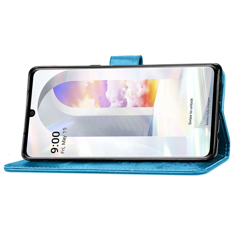 For LG Velvet 2 Pro Four-leaf Clasp Embossed Buckle Mobile Phone Protection Leather Case with Lanyard & Card Slot & Wallet & Bracket Function
