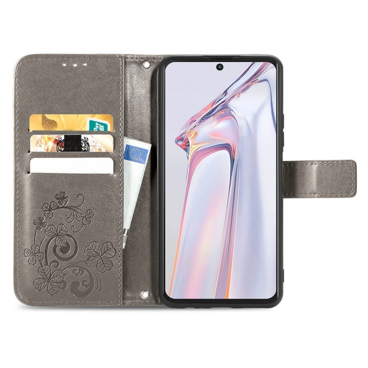 For Blackview A100 Four-leaf Clasp Embossed Buckle Mobile Phone Protection Leather Case with Lanyard & Card Slot & Wallet & Bracket Function