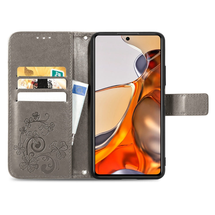 For Xiaomi Mi 11T / 11T Pro Four-leaf Clasp Embossed Leather Case with Lanyard & Card Slot & Wallet & Holder