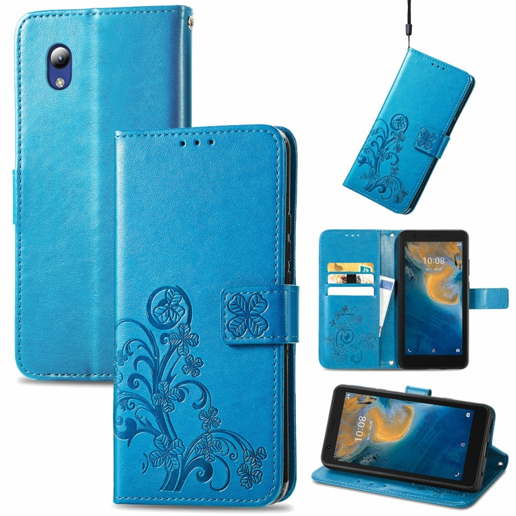 For ZTE Blade A31 Lite Four-leaf Clasp Embossed Leather Case with Lanyard & Card Slot & Wallet & Holder
