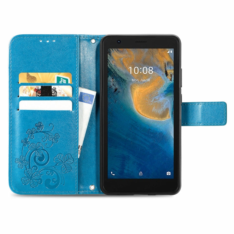 For ZTE Blade A31 Lite Four-leaf Clasp Embossed Leather Case with Lanyard & Card Slot & Wallet & Holder