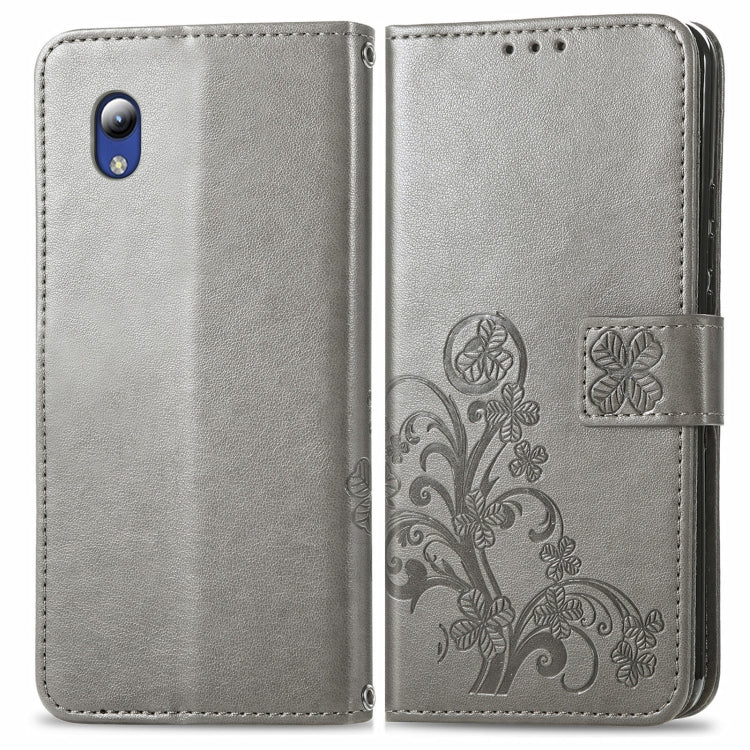 For ZTE Blade A31 Lite Four-leaf Clasp Embossed Leather Case with Lanyard & Card Slot & Wallet & Holder