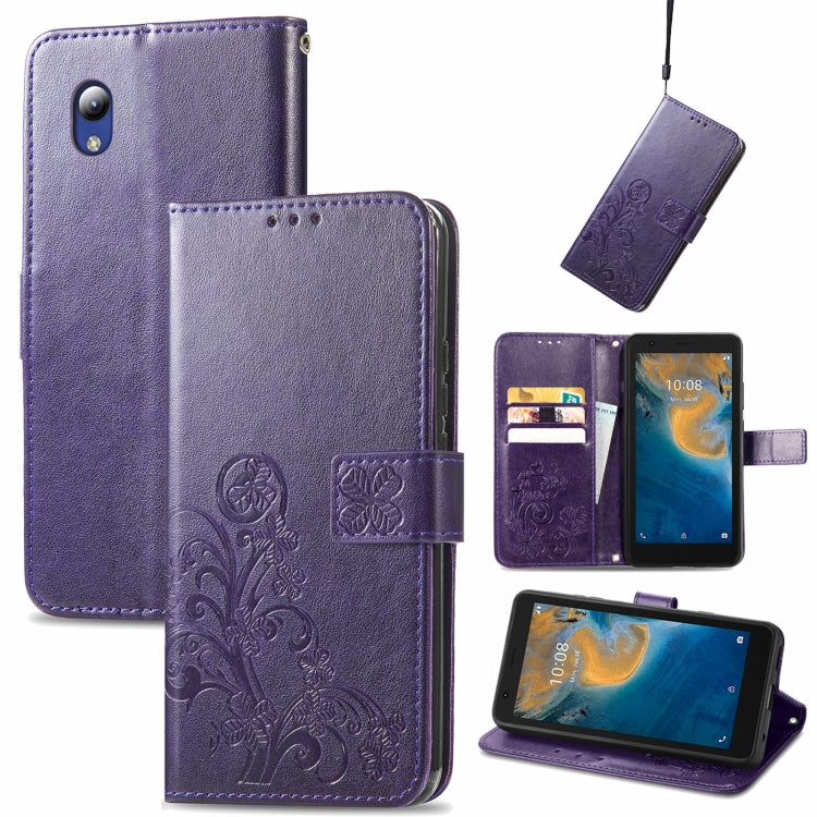 For ZTE Blade A31 Lite Four-leaf Clasp Embossed Leather Case with Lanyard & Card Slot & Wallet & Holder