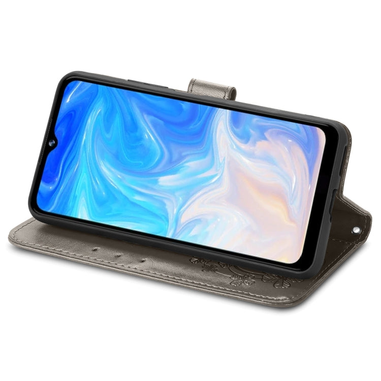 For DOOGEE N40 Pro Four-leaf Clasp Embossed Leather Case with Lanyard & Card Slot & Wallet & Holder