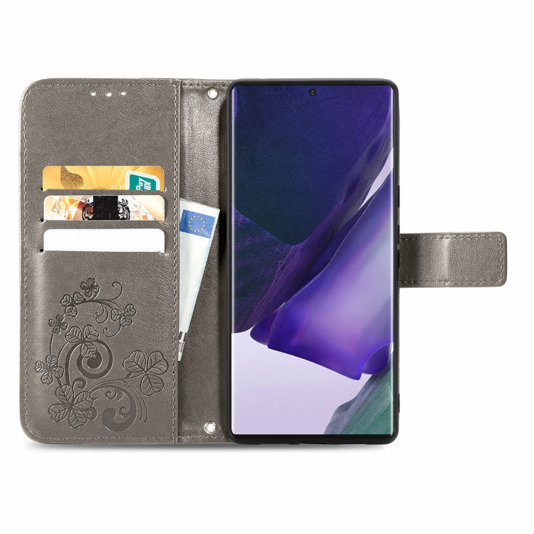 For Samsung Galaxy S22 Ultra 5G Four-leaf Clasp Embossed Leather Phone Case with Lanyard & Card Slot & Wallet & Bracket Function