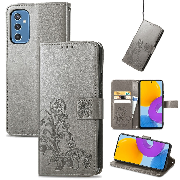For Samsung Galaxy M52  5G Four-leaf Clasp Embossed Leather Phone Case with Lanyard & Card Slot & Wallet & Bracket Function