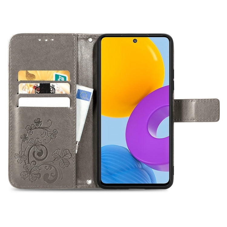 For Samsung Galaxy M52  5G Four-leaf Clasp Embossed Leather Phone Case with Lanyard & Card Slot & Wallet & Bracket Function