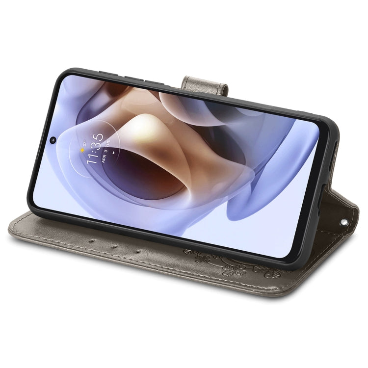 For Motorola Moto G31 Four-leaf Clasp Embossed Buckle Leather Phone Case