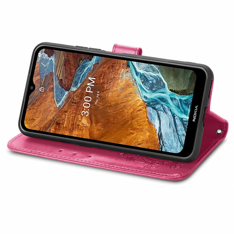 For Nokia G300 Four-leaf Clasp Embossed Buckle Leather Phone Case