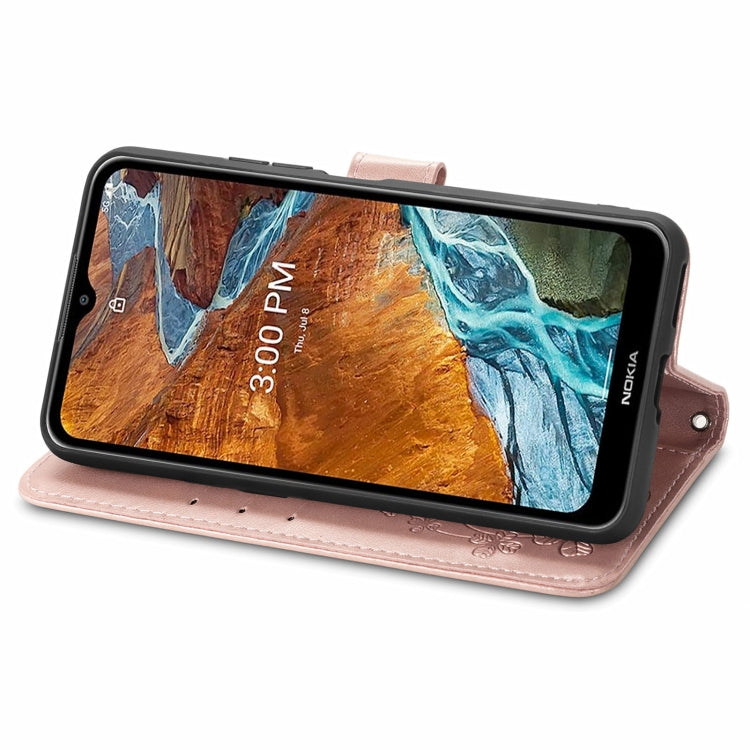 For Nokia G300 Four-leaf Clasp Embossed Buckle Leather Phone Case