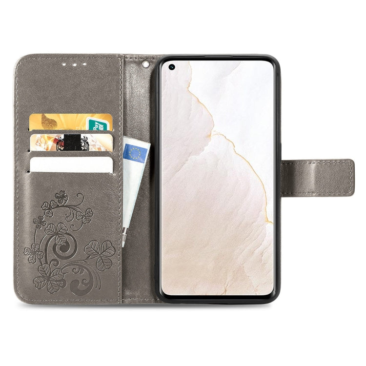 For OPPO Realme GT Explorer Master Four-leaf Clasp Embossed Buckle Leather Phone Case