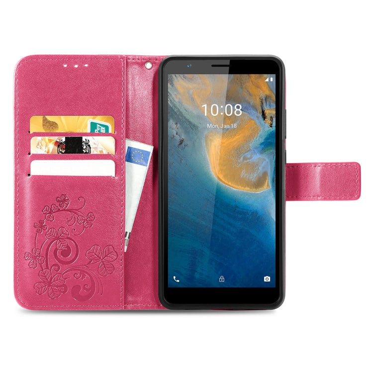 For ZTE Blade A31 Four-leaf Clasp Embossed Buckle Mobile Phone Leather Case