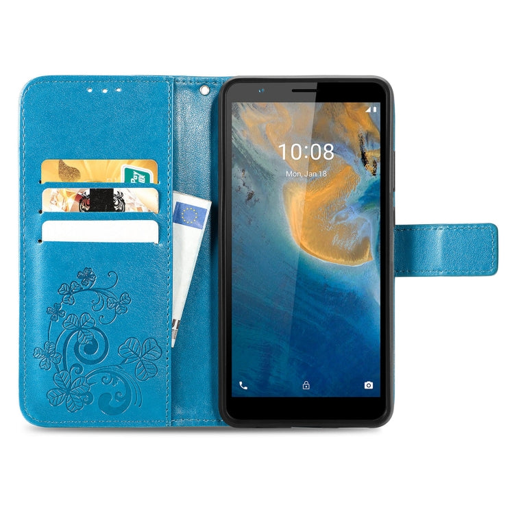 For ZTE Blade A31 Four-leaf Clasp Embossed Buckle Mobile Phone Leather Case