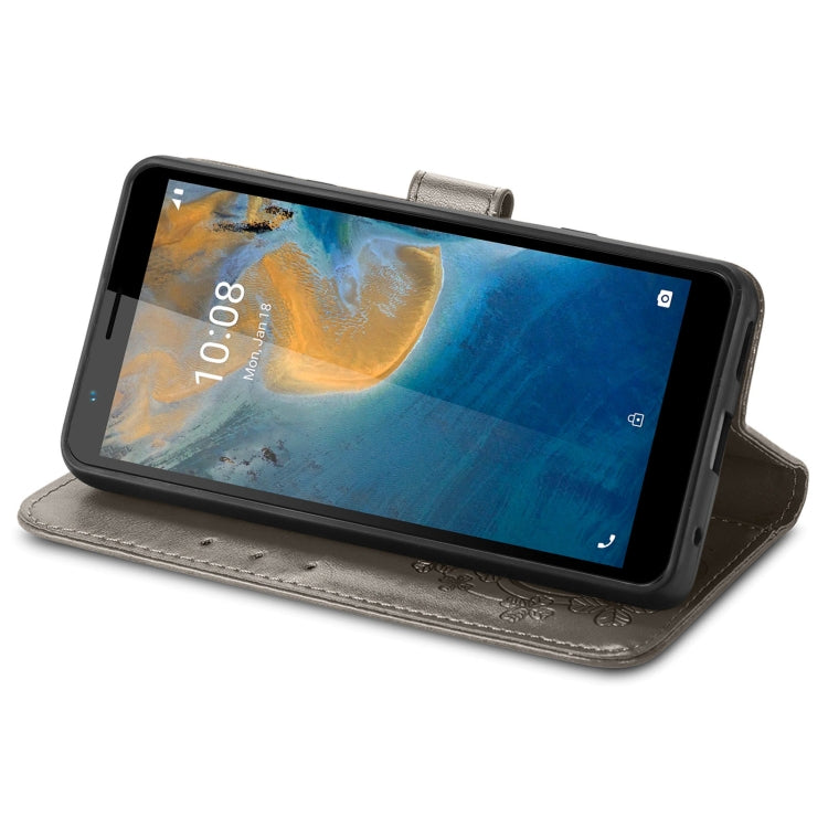 For ZTE Blade A31 Four-leaf Clasp Embossed Buckle Mobile Phone Leather Case