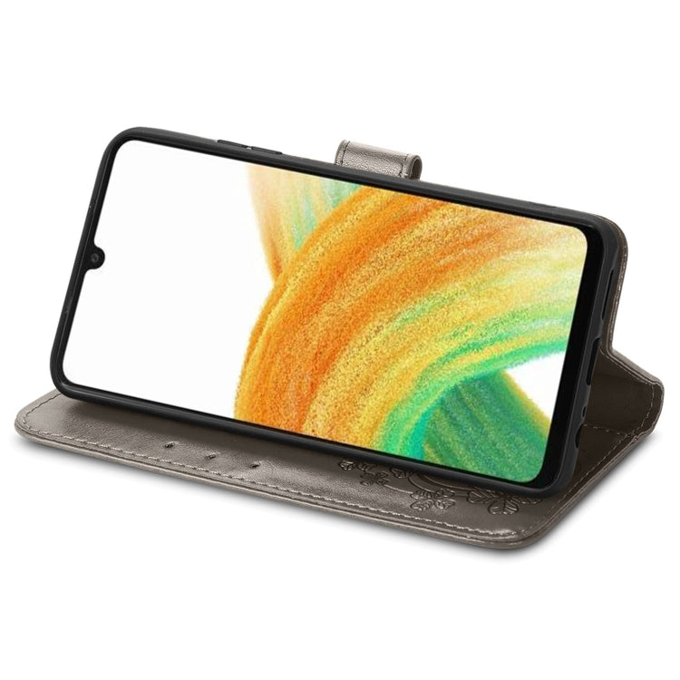 For Samsung Galaxy A13 4G Four-leaf Clasp Embossed Buckle Leather Phone Case