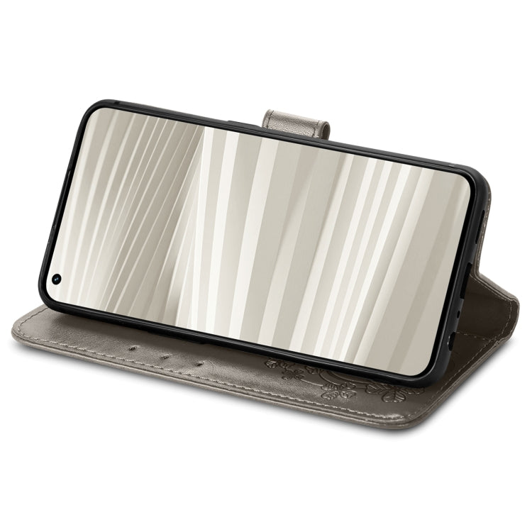 For OPPO Realme GT2 Pro Four-leaf Clasp Embossed Buckle Leather Phone Case