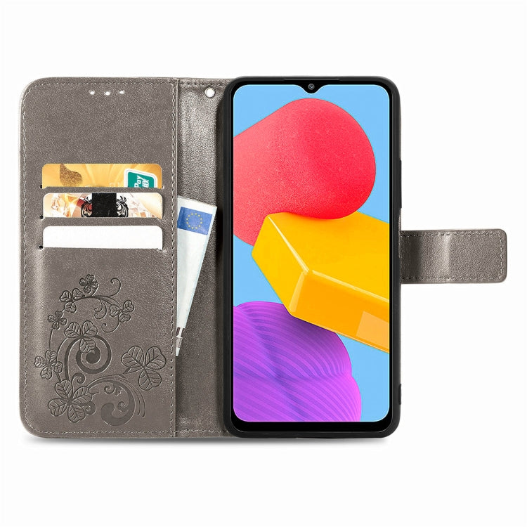 For Samsung Galaxy M13 4G Four-leaf Clasp Embossed Buckle Leather Phone Case