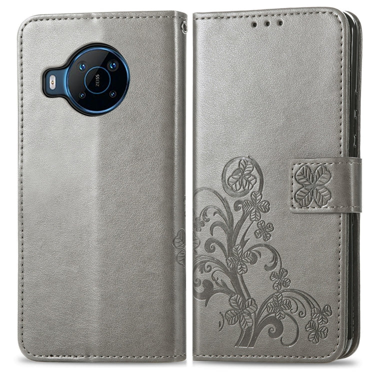 For Nokia X100 5G Four-leaf Clasp Embossed Buckle Leather Phone Case