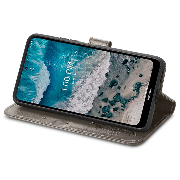 For Nokia X100 5G Four-leaf Clasp Embossed Buckle Leather Phone Case