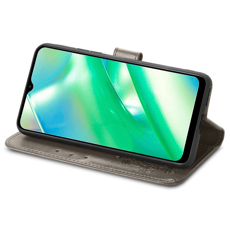 For Realme C33 Four-leaf Clasp Embossed Buckle Leather Phone Case