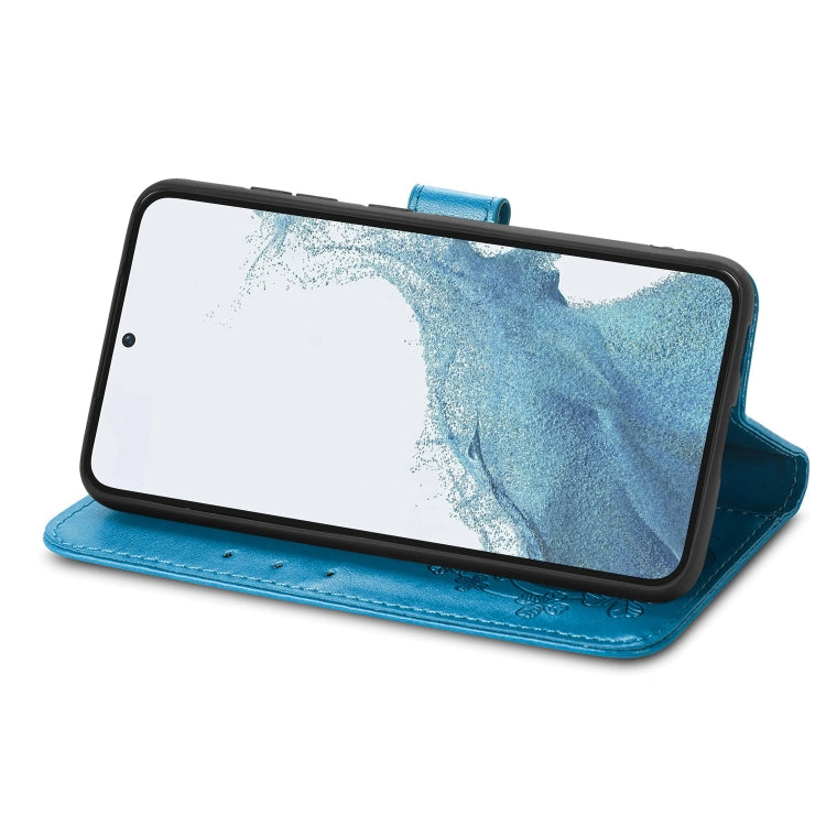 For Samsung Galaxy A04e Four-leaf Clasp Embossed Buckle Leather Phone Case