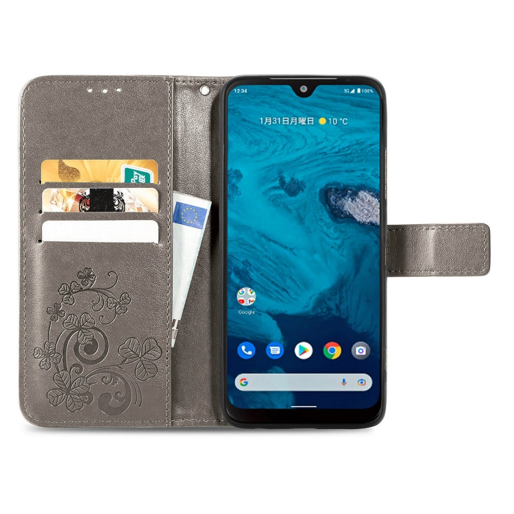 For Kyocera Android One S10 Four-leaf Clasp Embossed Buckle Leather Phone Case