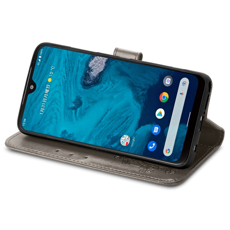 For Kyocera Android One S10 Four-leaf Clasp Embossed Buckle Leather Phone Case