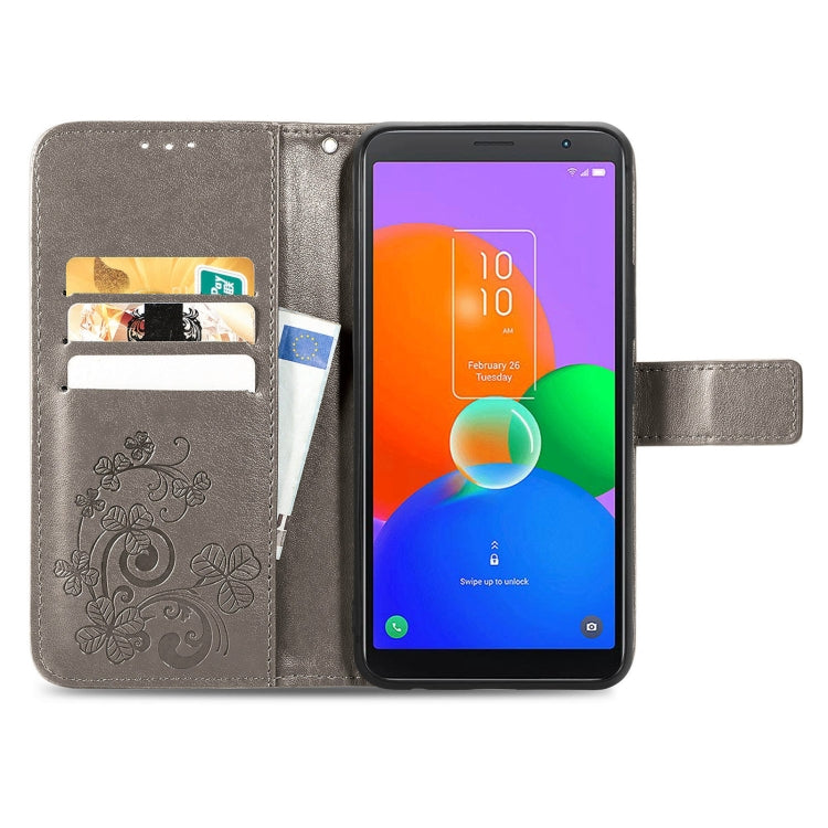 For TCL 403 Four-leaf Clasp Embossed Buckle Leather Phone Case