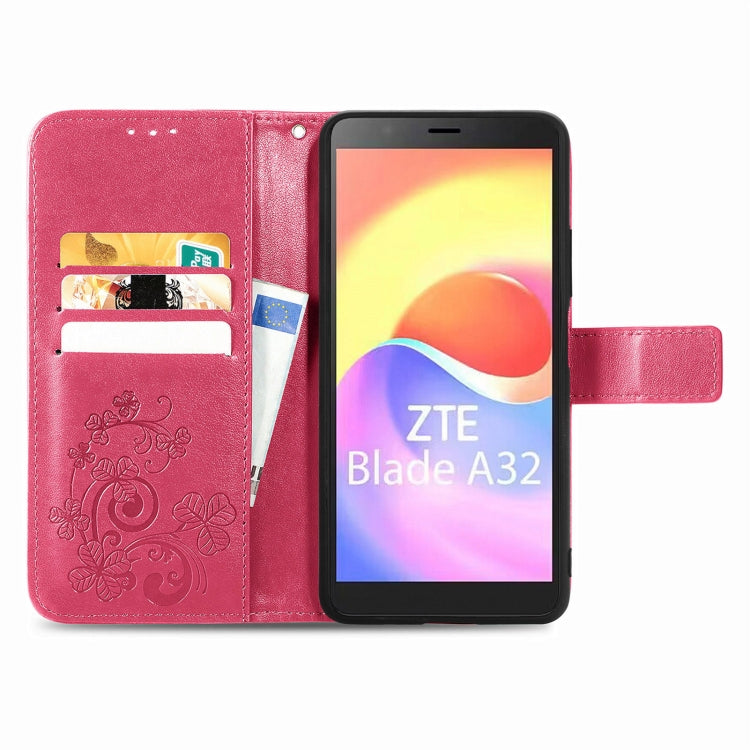 For ZTE Blade A32 Four-leaf Clasp Embossed Buckle Leather Phone Case