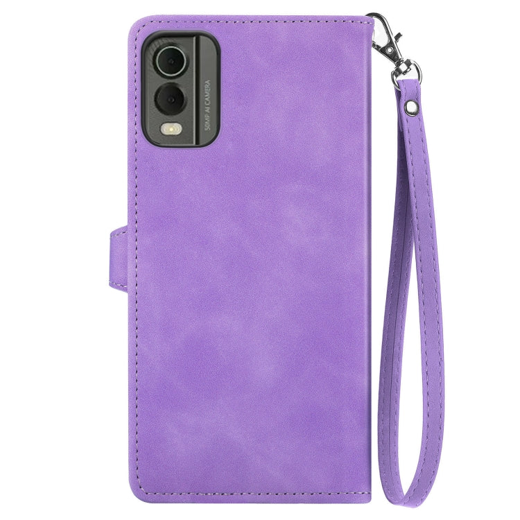 For Nokia C32 Embossed Flower Zipper Leather Phone Case