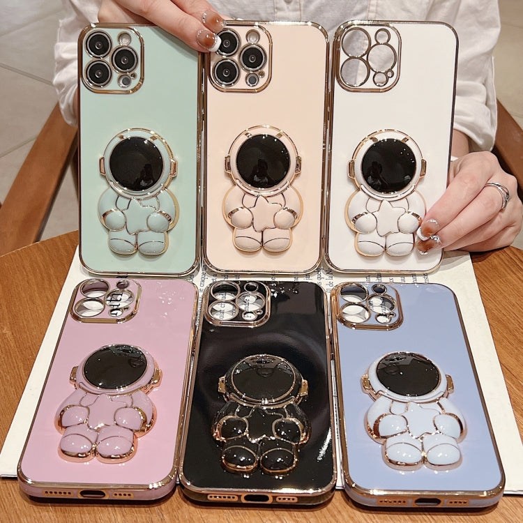 For iPhone 16 Embrace Stars Electroplating Astronaut Holder Phone Case