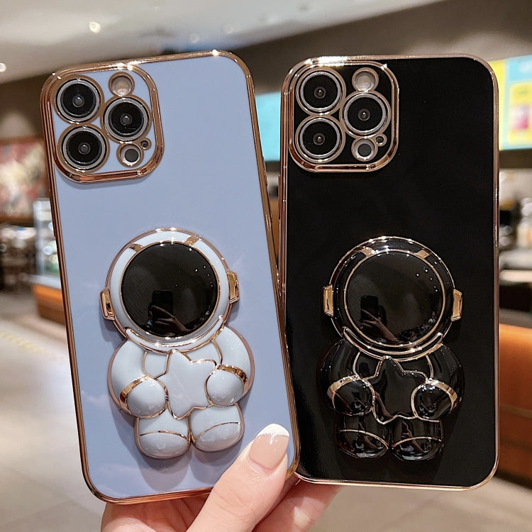 For iPhone 16 Embrace Stars Electroplating Astronaut Holder Phone Case
