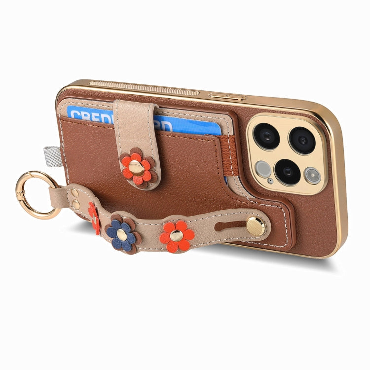 For iPhone 15 Plus Stereoscopic Flowers Wristband Card Bag Phone Case