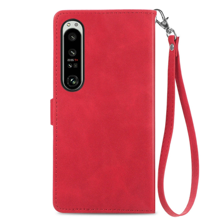 For Sony Xperia 1 IV Embossed Flower Zipper Leather Phone Case