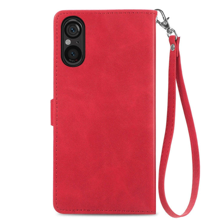 For Sony Xperia 5 V Embossed Flower Zipper Leather Phone Case