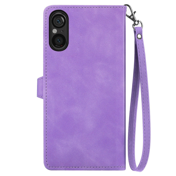 For Sony Xperia 5 V Embossed Flower Zipper Leather Phone Case
