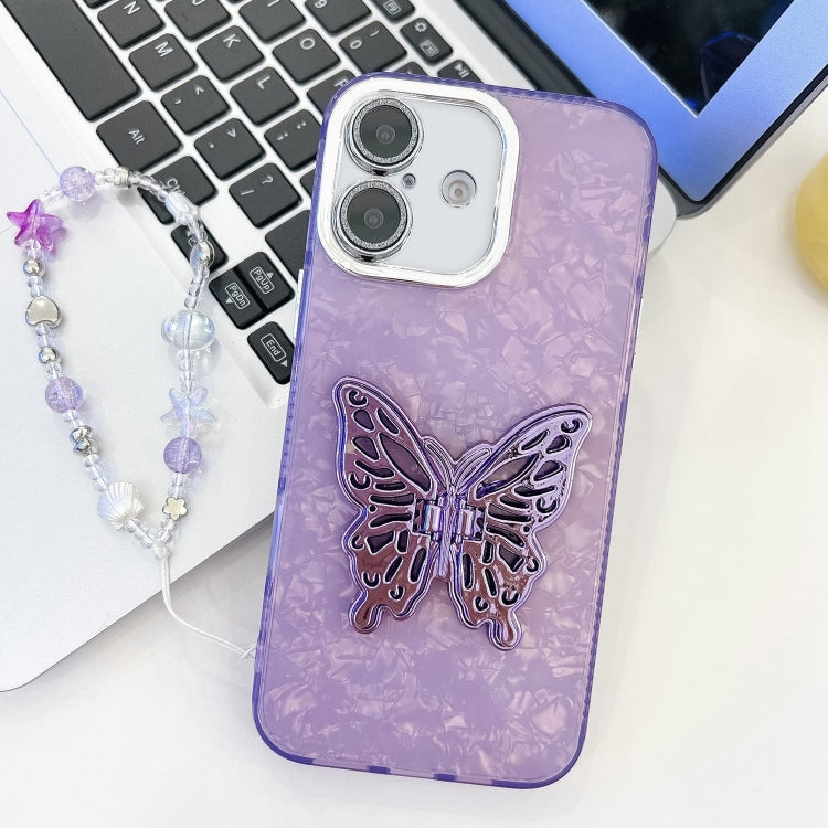 For iPhone 16 Plating Glitter Lens Film Texture Butterfly Holder Wristband Phone Case