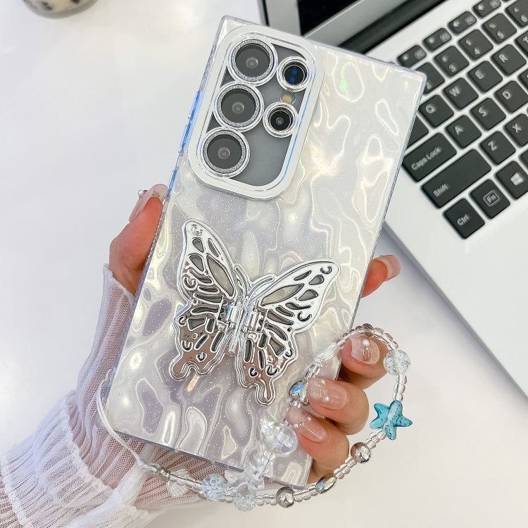 For Samsung Galaxy S23 Ultra 5G Plating Glitter Lens Film Texture Butterfly Holder Wristband Phone Case
