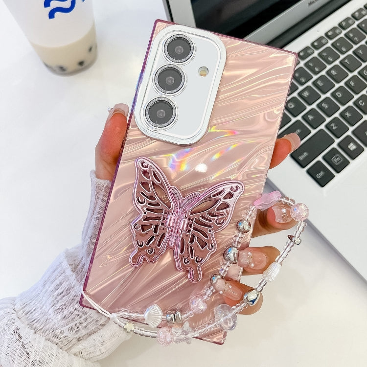 For Samsung Galaxy S25 5G Plating Glitter Lens Film Texture Butterfly Holder Wristband Phone Case