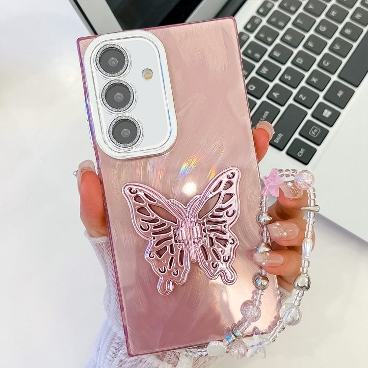 For Samsung Galaxy S25 5G Plating Glitter Lens Film Texture Butterfly Holder Wristband Phone Case