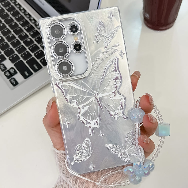 For Samsung Galaxy S23 Ultra 5G Plating Texture Butterfly Wristband TPU Phone Case with Glitter Lens Film
