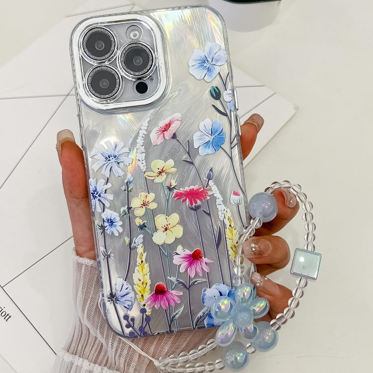For iPhone 16 Pro Electroplating Flowers Plants Texture Wristband TPU Phone Case